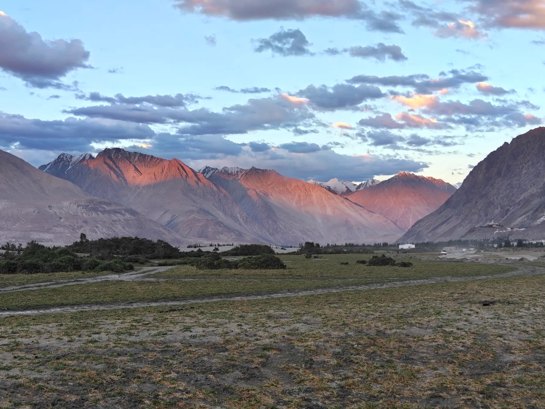 Alpenglow on the peaks above Nubra Valley at dusk
